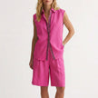 Pink women's summer two-piece pleated co-ord set by FJØRNA, lightweight matching top and skirt ensemble.