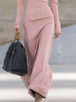 Pink V-neck maxi dress by FJØRNA, flowing evening dress with a flattering V-neckline and elegant length.