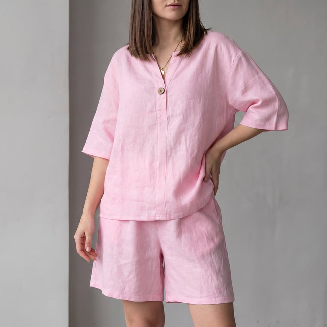 Pink FJØRNA women's two-piece co-ord set with V-neck top and pockets, lightweight and stylish for casual wear.