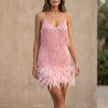 Pink FJØRNA elegant mini dress for women with V-neck and cami straps, perfect for stylish occasions.