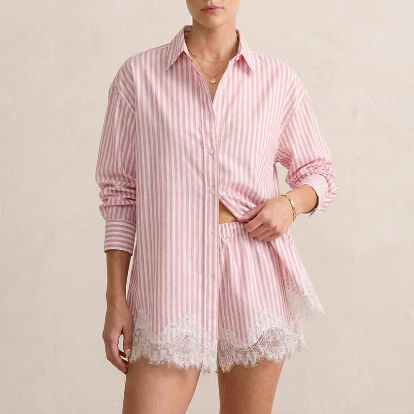 Pink and white lace two-piece women's co-ord set by FJØRNA, featuring elegant design and coordinated top and skirt.