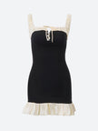 FJØRNA women's mini dress with pleated hem, perfect for party and daytime occasions, showcasing a stylish and feminine design.