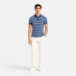 Men's FJØRNA striped polo shirt with breathable fabric, slim fit design, and classic style for casual wear.