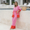 FJØRNA women's summer two-piece co-ord set with geometric pockets and V-neck, featuring a stylish, casual design.
