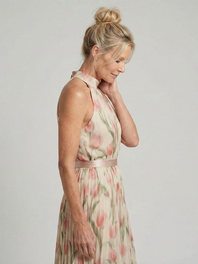 FJØRNA women's floral halter neck midi dress, stylish summer dress with vibrant floral pattern and elegant halter neckline.