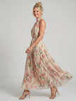 FJØRNA women's floral halter neck midi dress, sleeveless summer dress with a vibrant statement print and elegant silhouette.