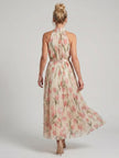 FJØRNA women's floral halter neck midi dress featuring sleeveless design, perfect for summer occasions.