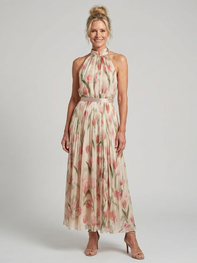 FJØRNA women's floral halter neck midi dress with a quiet statement design, perfect for summer occasions.