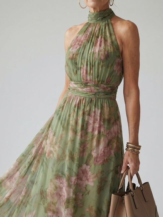 FJØRNA women's floral summer maxi dress with halter neck, gathered design, perfect for warm weather and casual occasions.