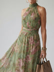FJØRNA women's summer maxi dress with floral print, halter neck, sleeveless, lightweight fabric, perfect for warm weather.