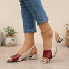 Red FJØRNA textured slingback block heel sandals with open toe and gold accent, showcasing stylish footwear design.