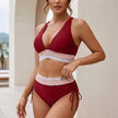 Red striped FJØRNA cropped bikini set for women, featuring a stylish top and matching bottoms perfect for summer beachwear.