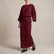 Red FJØRNA summer two-piece women's co-ord set with wrap top and matching shorts, casual and stylish for warm weather.