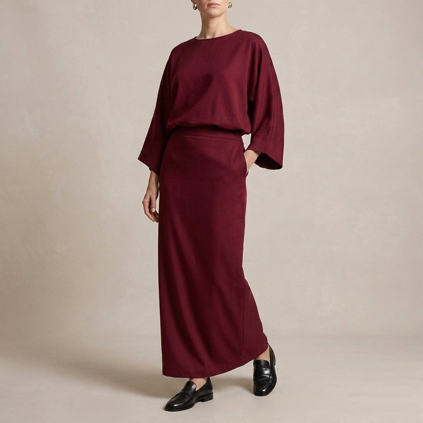 Red FJØRNA summer two-piece women's co-ord set with wrap top and matching shorts, casual and stylish for warm weather.