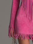 Red faux suede mini western dress by FJØRNA featuring tassel details and casual Western style, shown on a model.