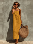 Red linen casual dress by FJØRNA, featuring a relaxed fit and sleeveless design, perfect for warm-weather styling.