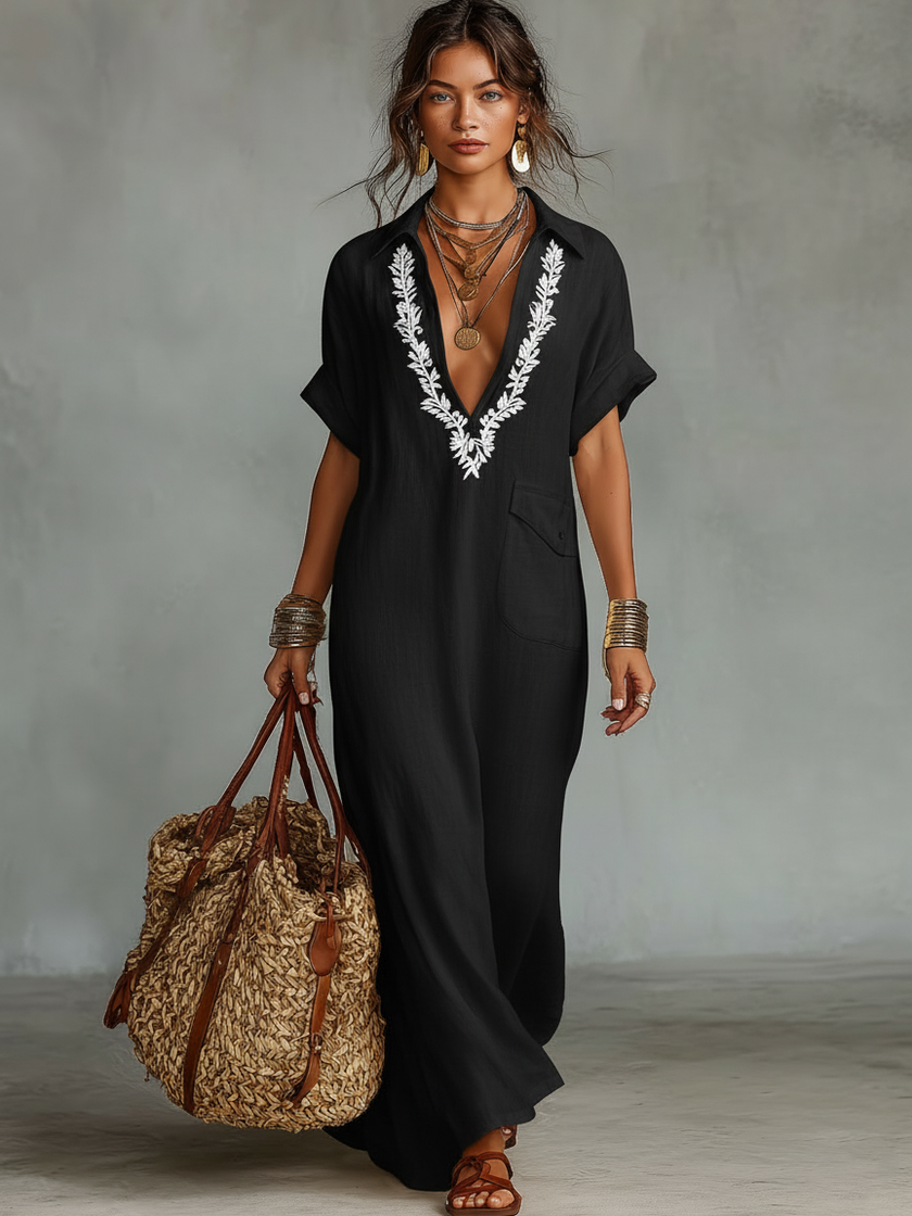 Red linen embroidered maxi dress for women by FJØRNA, flowing design with intricate embroidery details, sleeveless style.