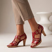 Red FJØRNA women's orthopedic heeled sandals with adjustable straps and open-toe design, showcasing stylish and comfortable footwear.