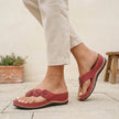Red FJØRNA orthopedic floral applique wedge thong sandals for women showing floral details and wedge heel.
