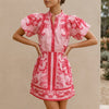 Red linen floral two-piece women's co-ord set by FJØRNA, featuring a stylish top and matching skirt.