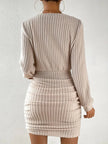 FJØRNA ribbed knit women's mini dress featuring a fitted style, perfect for party or daytime wear, shown in a close-up image.