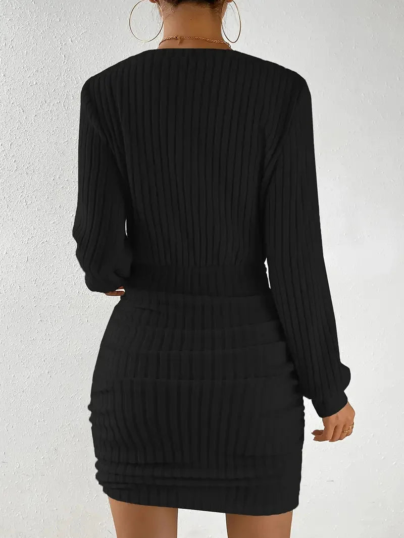 Ribbed knit women's mini dress by FJØRNA featuring a fitted silhouette, short sleeves, and stylish design for day or party wear.