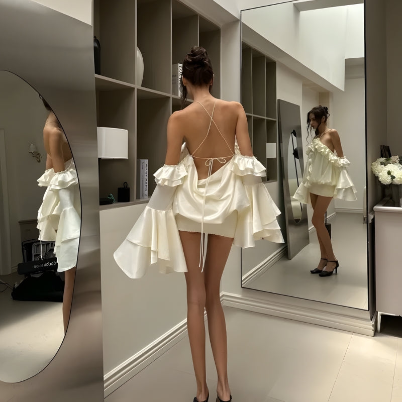 FJØRNA rose ruffled women's mini dress with floral details, perfect for party or daytime wear, shown on a model.