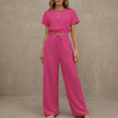 Rose red women's summer two-piece co-ord set from FJØRNA with drawstring detail, lightweight fabric, perfect for warm weather.