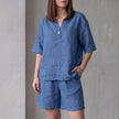 Royal blue women's two-piece co-ord set by FJØRNA featuring V-neck top with pockets and lightweight fabric.