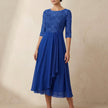 Royal blue FJØRNA elegant midi bodycon chiffon dress for women, showcasing a fitted silhouette and flowing fabric.