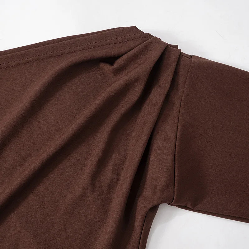 FJØRNA ruched bodycon mini dress for women, perfect for party and cocktail occasions, shown in a stylish, fitted design.
