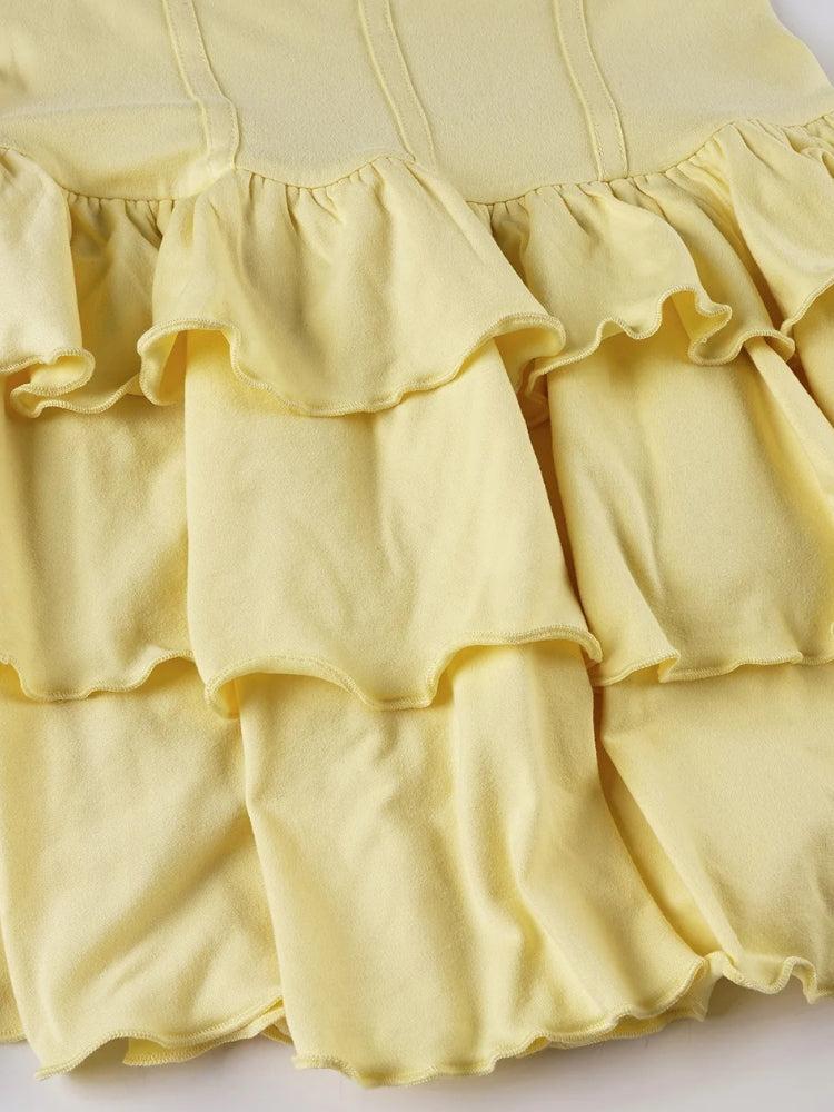 FJØRNA women's ruffled halter mini dress with a stylish design, perfect for party or day wear, shown from the front.