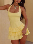 FJØRNA ruffled halter mini dress, women's party and day style dress with flowing ruffles and sleeveless design.