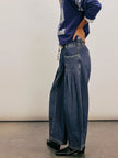 Women’s wide-leg cotton jeans with drawstring waist by FJØRNA, showcasing relaxed fit and casual style in natural fabric.
