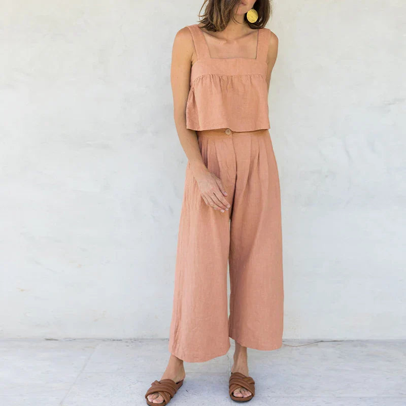 FJØRNA linen cropped culotte trousers for women featuring wide-leg design and lightweight breathable fabric.