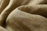 FJØRNA women's linen tapered trousers, lightweight and breathable pants for women, shown in natural fabric and relaxed fit.
