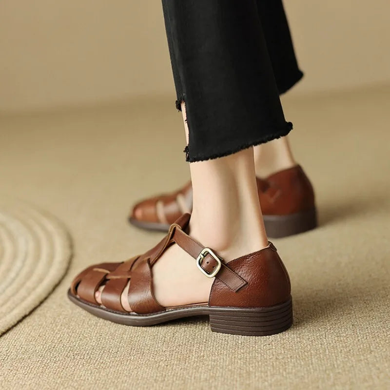 FJØRNA women's brown Italian leather adjustable strap sandals with open toe and flat sole, stylish summer footwear.