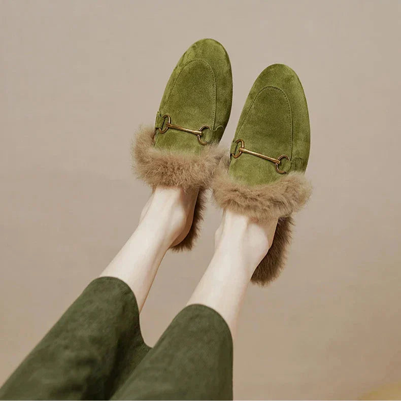 FJØRNA women's plush fur mule slippers with slip-on design and cozy lining, perfect for indoor comfort and luxury footwear.