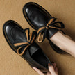 FJØRNA women's dual-tone leather loafers featuring handcrafted design and cushioned insoles, stylish slip-on shoes for women.