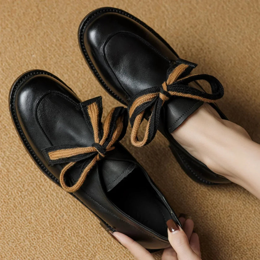 FJØRNA women's dual-tone leather loafers featuring handcrafted design and cushioned insoles, stylish slip-on shoes for women.
