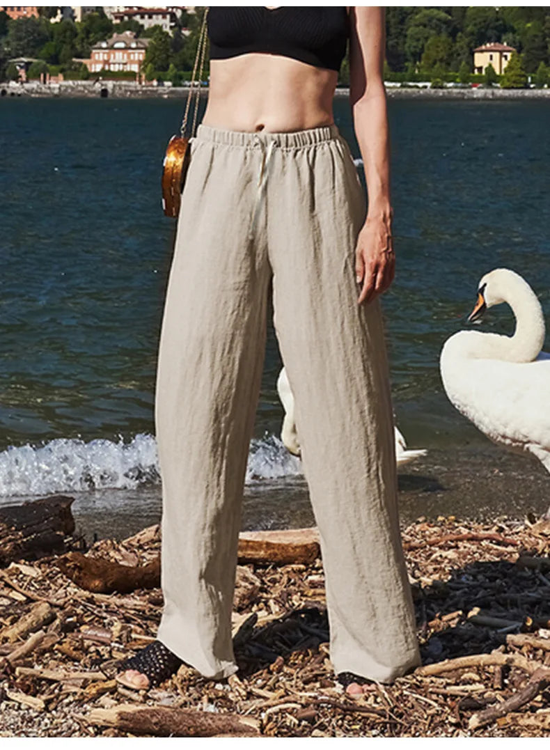 FJØRNA women's knit wide-leg trousers with drawstring waist, showcasing soft fabric, relaxed fit, and stylish casual design.