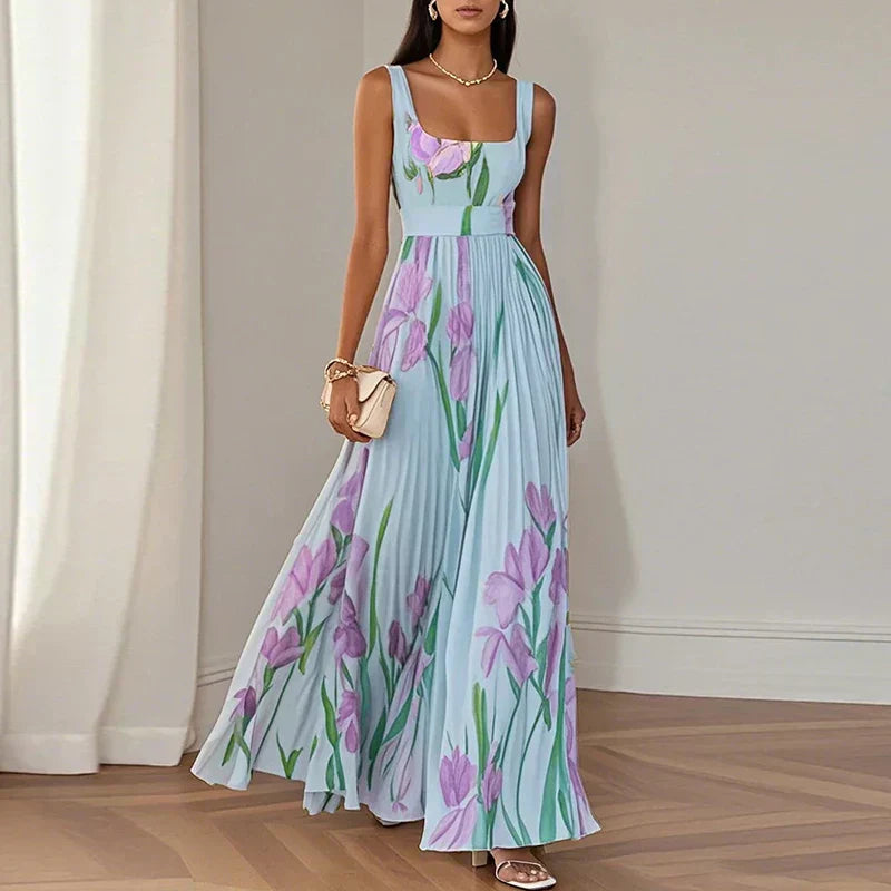 FJØRNA elegant floral maxi dress for women, A-line style with a flowing silhouette and vibrant floral pattern.