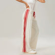 Women’s high waist cotton joggers by FJØRNA with elastic waistband, shown in a casual, relaxed fit style.
