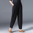 FJØRNA lightweight summer tapered women's trousers with elastic waistband, casual and breathable for warm weather.