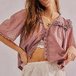 Cream cropped cotton blouse with lace trim for women by FJØRNA, featuring a stylish and feminine design.