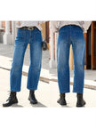 FJØRNA women's denim jeans with a barrel leg fit, showcasing a classic blue color and relaxed, stylish pant design.