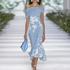 FJØRNA elegant floral off-shoulder midi dress for women, showcasing a flowy design with a fitted waist and feminine style.
