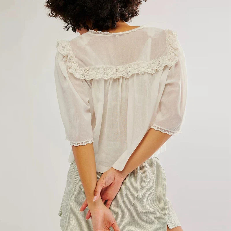 FJØRNA cream cropped cotton blouse for women with lace trim, white top featuring short sleeves and feminine detailing