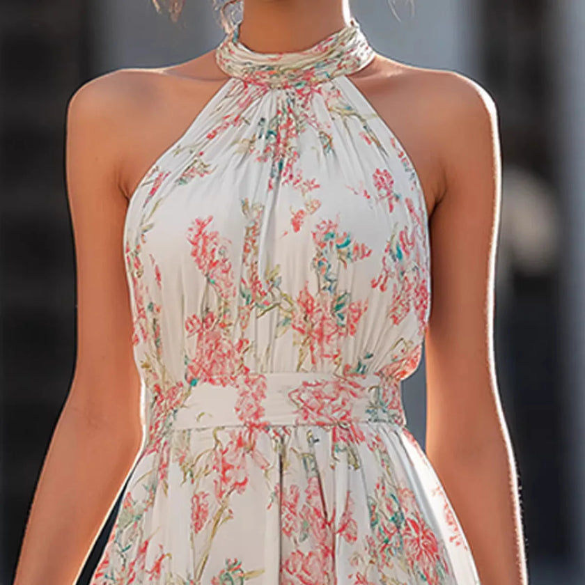 FJØRNA Fiona flowy halter maxi dress in white, elegant sleeveless dress with a long, flowing skirt and halter neckline.