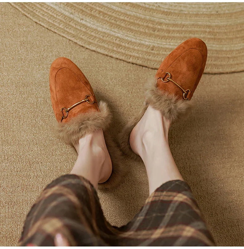 FJØRNA women's plush fur mule slippers with slip-on design and cozy lining for luxurious comfort.